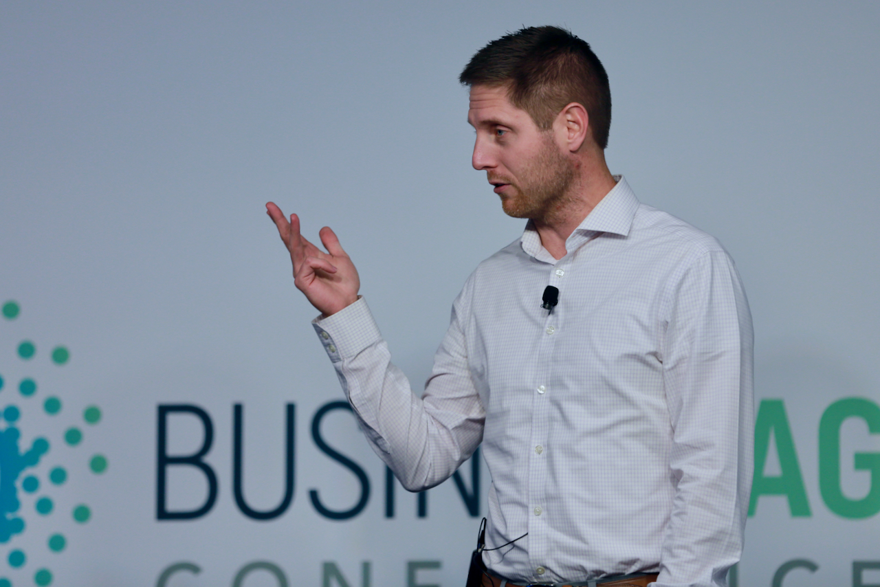 Photo of Ryan on stage at Business Agility Conference 2022
